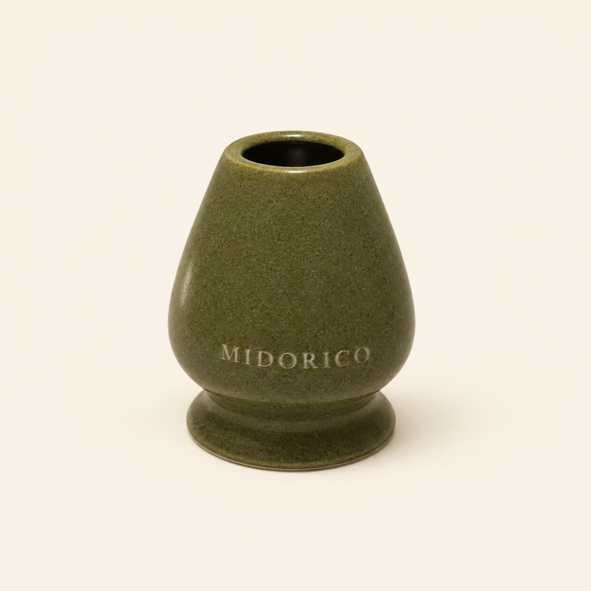 Midorico engraved ceramic matcha whisk holder in Moss Jade olive green, studio view