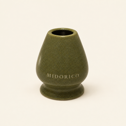 Midorico engraved ceramic matcha whisk holder in Moss Jade olive green, studio view