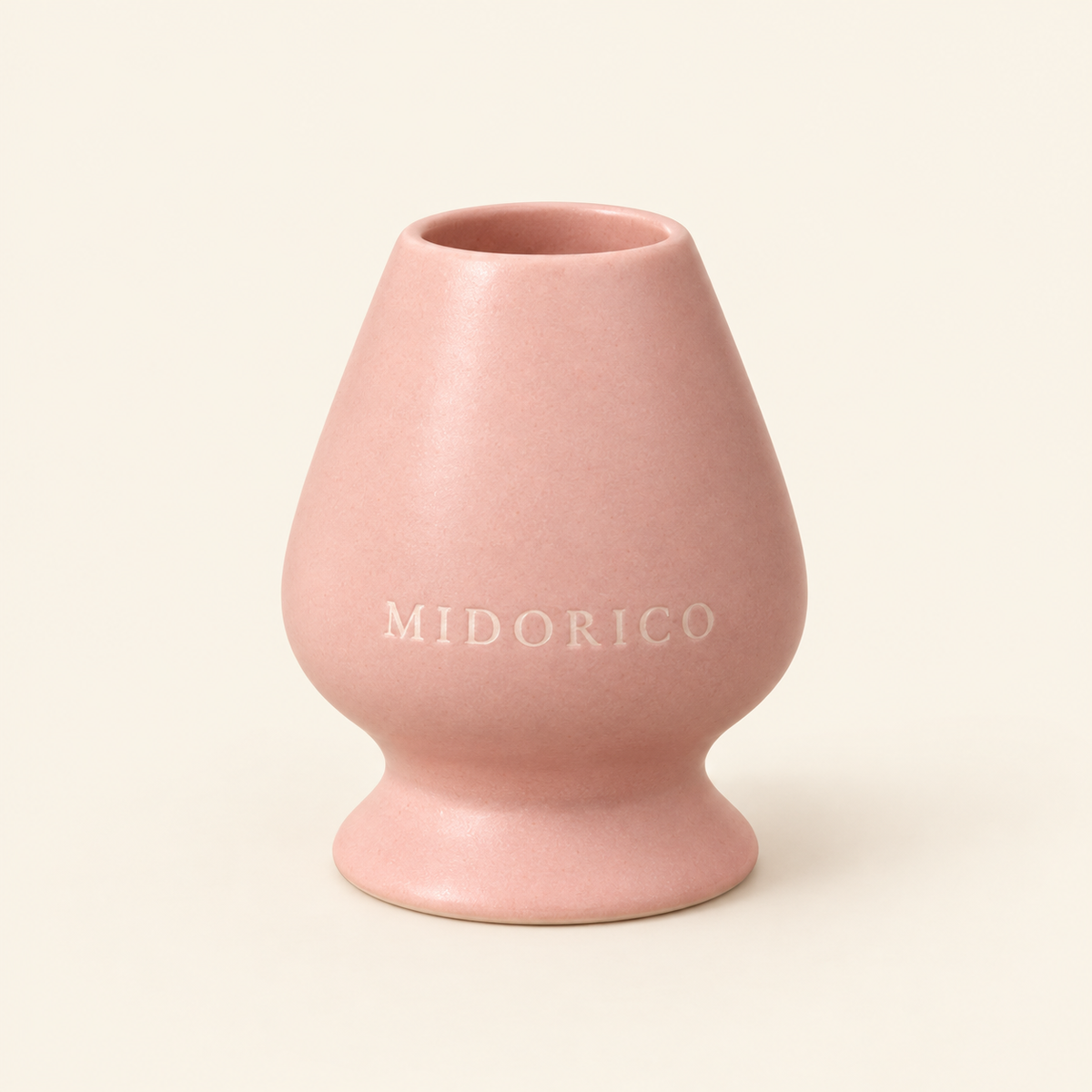 Midorico engraved ceramic matcha whisk holder in Sakura Blush pink, studio view