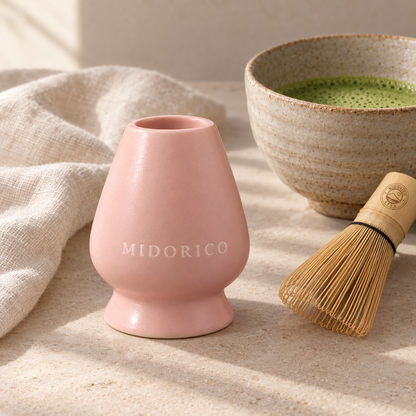 Sakura Blush pink engraved whisk holder styled beside matcha and a bamboo whisk; other items sold separately